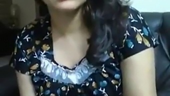 Big-Breasted Indian Mature Woman Engages In Video Chat With Her Partner