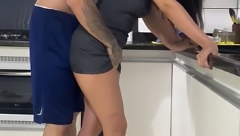 Husband And Wife Engage In Sexual Activity In The Kitchen While Cleaning It