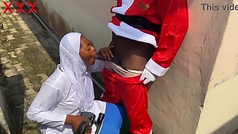 Christmas-Themed Sexual Encounter With A Sexy Woman In Hijab And Santa