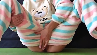 A Young Girl With Petite Breasts In Her Nightwear Pleasures Herself To A Squirting Climax