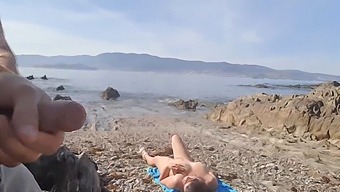 A Nudist Milf Receives A Flash Of A Young Man'S Genitals On The Beach
