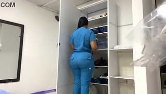 A Latina Nurse Massages A Patient'S Large Butt In The Office